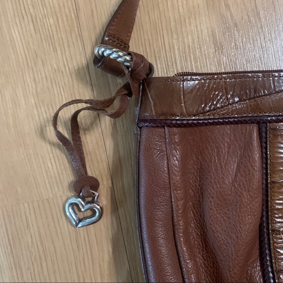 Brighton
Shoulder Bag Brown Leather Satchel
11"L x 3.5"W x 12"H - Picture 4 of 7